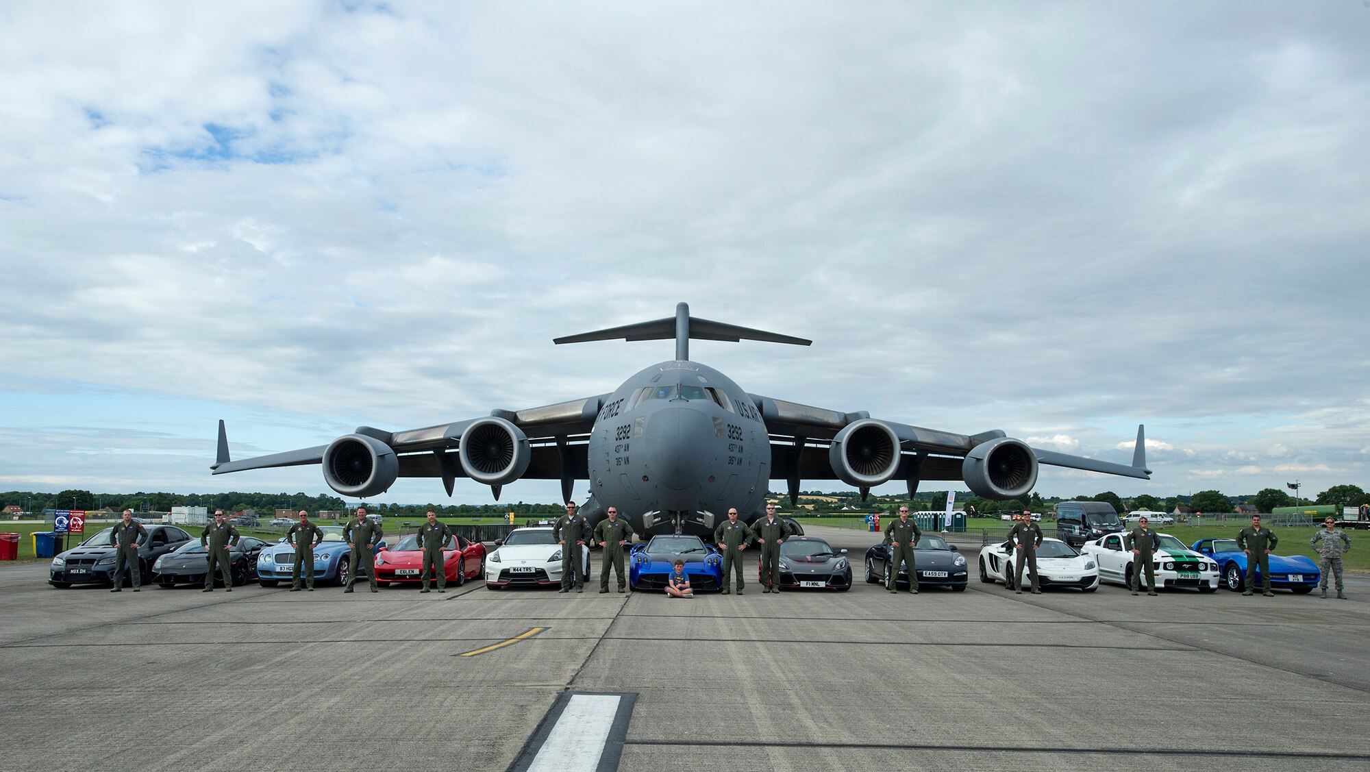 We met up with few of our friends at Royal Naval Air Station, U.K. who also have cool rides, and took this photo with them. Citizen Airmen from the 701st Airlift Squadron set the bar high by flying the first C-17 low-level pass through the “Mach Loop” and captured another win for their static display at the the air show Friday and Saturday. (U.S. Air Force Photo \ Tech. Sgt. Bobby Pilch)
