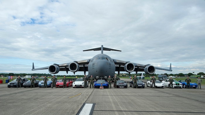 We met up with few of our friends at Royal Naval Air Station, U.K. who also have cool rides, and took this photo with them. Citizen Airmen from the 701st Airlift Squadron set the bar high by flying the first C-17 low-level pass through the “Mach Loop” and captured another win for their static display at the the air show Friday and Saturday. (U.S. Air Force Photo \ Tech. Sgt. Bobby Pilch)