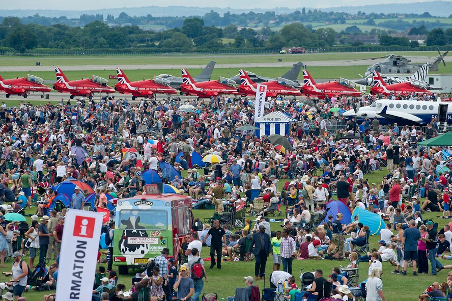 The Royal Air Force Red Arrow line up at the Yeovilton International Air Day at Royal Naval Air Station, U.K.  Citizen Airmen from the 701st Airlift Squadron set the bar high by flying the first C-17 low-level pass through the “Mach Loop” and captured another win for their static display at the the air show Friday and Saturday. (U.S. Air Force Photo \ Tech. Sgt. Bobby Pilch)