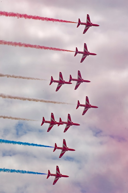 The Royal Air Force Red Arrows Demonstration Team was the highlight of the aerial demonstrations at the Yeovilton International Air Day at Royal Naval Air Station, U.K. Citizen Airmen from the 701st Airlift Squadron set the bar high by flying the first C-17 low-level pass through the “Mach Loop” and captured another win for their static display at the the air show Friday and Saturday. (U.S. Air Force Photo \ Tech. Sgt. Bobby Pilch)