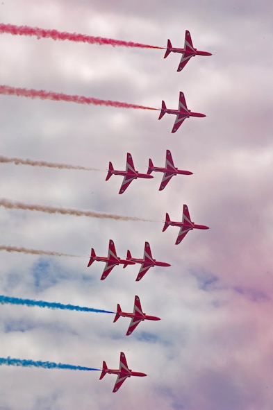 The Royal Air Force Red Arrows Demonstration Team was the highlight of the aerial demonstrations at the Yeovilton International Air Day at Royal Naval Air Station, U.K. Citizen Airmen from the 701st Airlift Squadron set the bar high by flying the first C-17 low-level pass through the “Mach Loop” and captured another win for their static display at the the air show Friday and Saturday. (U.S. Air Force Photo \ Tech. Sgt. Bobby Pilch)