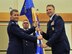 Lt. Col. Alex Mignery, right, accepts command of the 341st Civil Engineer Squadron from Col. Marcus Glenn, 341st Mission Support Group commander, July 7, 2017, at Malmstrom Air Force Base, Mont. Master Sgt. Paul Watts, 341st CES first sergeant, looks on. (U.S. Air Force photo/John Turner)