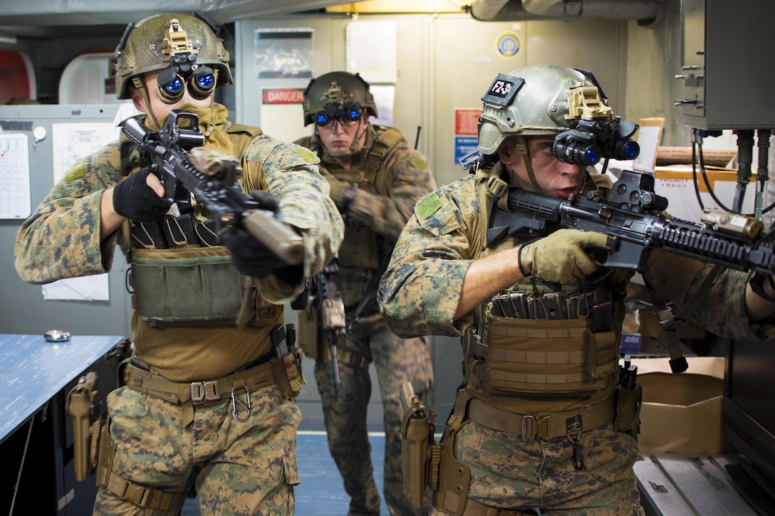 Marines practice room clearing techniques during visit, board, search and seizure training aboard the USS Bonhomme Richard in the Coral Sea, July 6, 2017, during Talisman Saber 17. Talisman Saber is a biennial U.S.-Australia exercise designed to enhance interoperability and strengthen the nations’ alliance. Navy photo by Petty Officer 3rd Class William Sykes