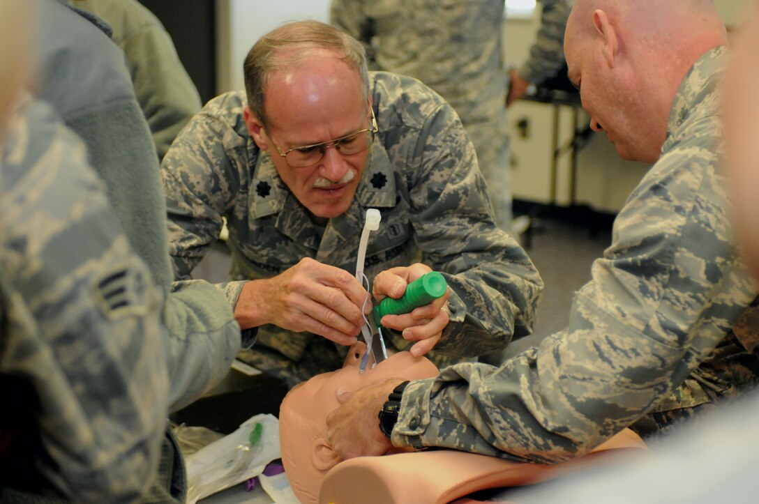 Lt. Col. Glen Hardin, a flight surgeon with the Iowa Air National Guard’s 185th Air Refueling Wing, demonstrates intubation in which a tube is inserted in a patient to help keep their airway open. The training was part of training the unit’s medical group conducted while at Camp Rilea, Oregon. The Airmen were in Oregon to participate in Pathfinder-Minuteman, a mass causality exercise. U.S. Air National Guard photo by Capt. Jeremy J. McClure