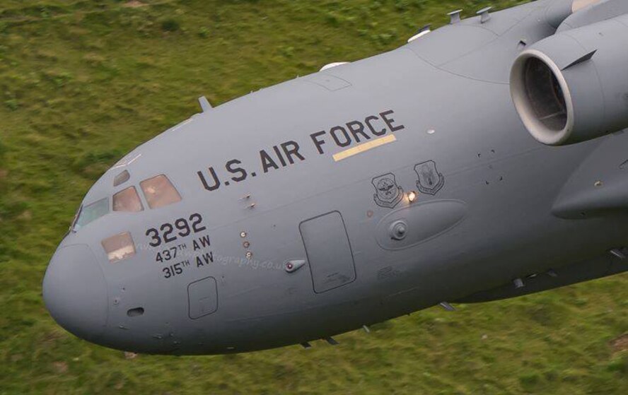 Citizen Airmen from the 701st Airlift Squadron made history by flying the first C-17 Globemaster III low-level pass through the “Mach Loop” in Wales, U.K. (Courtesy Photo by Paul Williams)