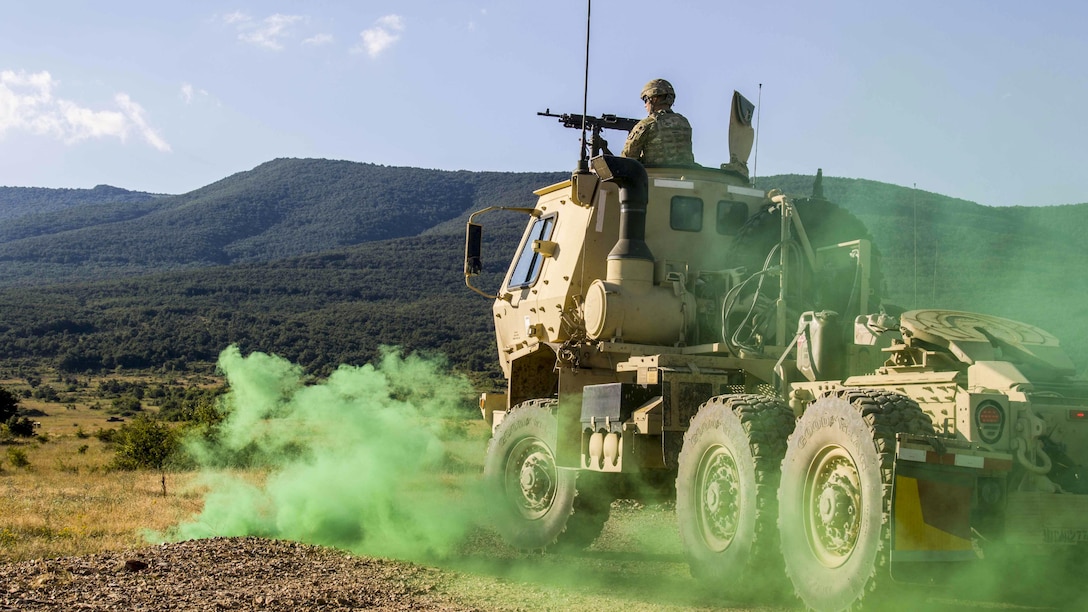 A soldier engages a target during a convoy live-fire exercise at Novo Selo Training Area, Bulgaria, July 7, 2017, as part of exercise Saber Guardian 17. The soldiers are assigned to the 277th Aviation Support Battalion. Army photo by Spc. Thomas Scaggs