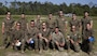 Marines gather in front of a CH-53 Super Stallion at Landing Zone Vulture after rappelling during a ceremony at Stone Bay, a Camp Lejeune satellite training area, N.C., May 17, 2017.  The ceremony marks the reopening of Landing Zone Vulture, which closed Sept. 2, 2015 after a CH-53 crashed resulting in the death of one Marine.  The instructors took the opportunity to memorialize their fallen Marine, Staff Sgt. Jonathan Lewis, through the sustainment rappel. The Marines are with EOTG, II Marine Expeditionary Force Headquarters Group.