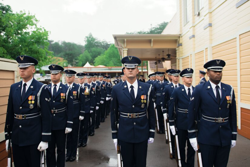 The U.S. Air Force Honor Guard prepares to perform a flag raising ceremony at the Dollywood theme park in Pigeon Forge, Tenn., July 4, 2017. The ceremony provided an opportunity for the honor guard to honor veterans and inspire patriotism while showcasing the Air Force mission. (U.S. Air Force photo by Senior Airman Delano Scott)