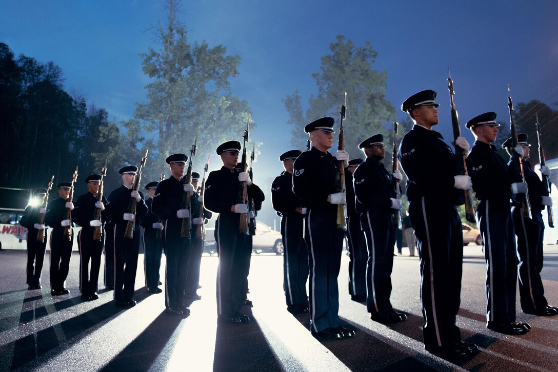 Members of the U.S. Air Force Honor Guard practice drill movements prior to marching in the Gatlinburg Independence Day Parade in Gatlinburg, Tenn., July 3, 2017. The parade kicked off at 12:01 a.m., making it the first Independence Day parade in the nation. (U.S. Air Force photo by Senior Airman Delano Scott)