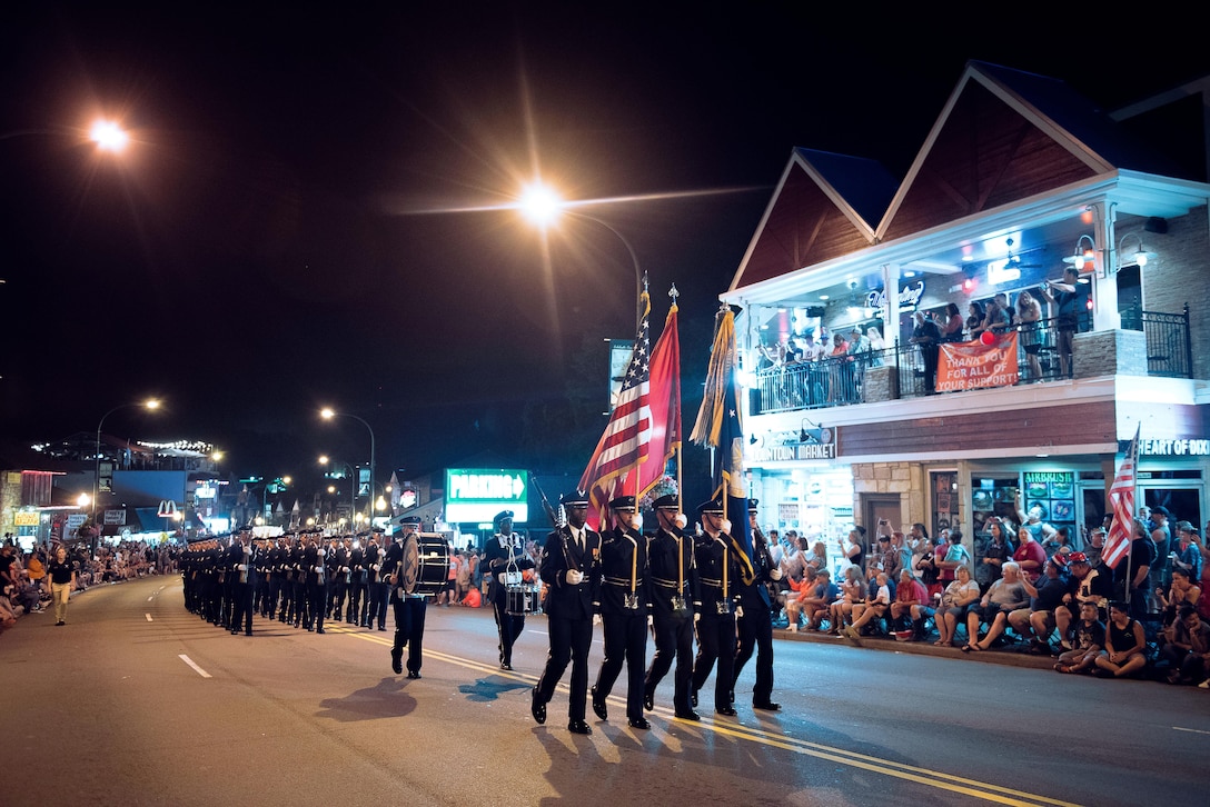 The U.S. Air Force Honor Guard marches in the Gatlinburg Independence Day Parade in Gatlinburg, Tenn., July 4, 2017. The honor guard marched in front a crowd of more than 120,000 people throughout the parade route. (U.S. Air Force photo by Senior Airman Delano Scott)