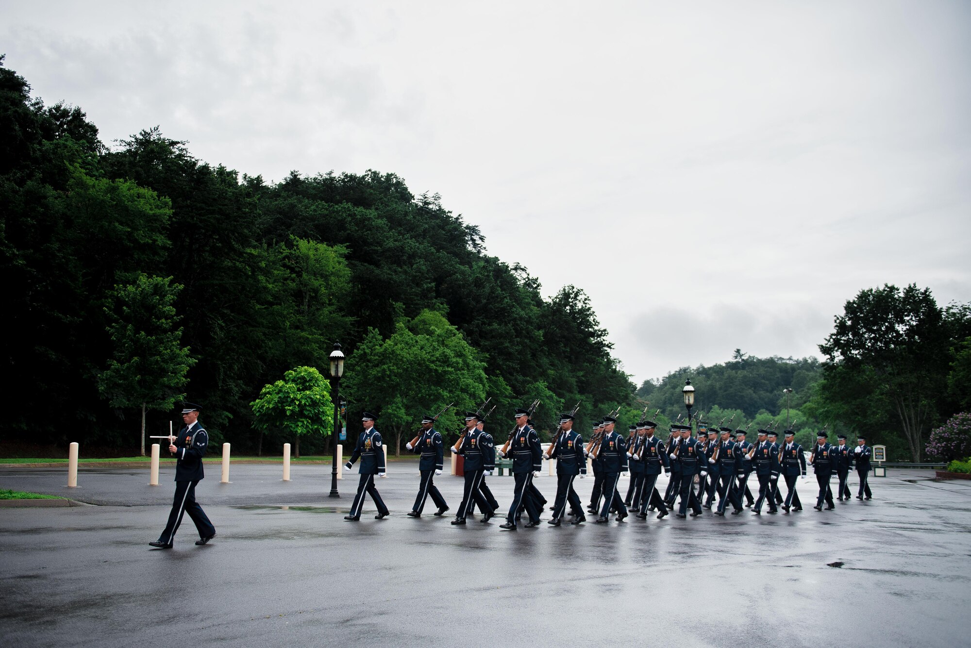 The U.S. Air Force Honor Guard prepare to perform a flag raising ceremony at the Dollywood theme park in Pigeon Forge, Tenn., July 4, 2017. The ceremony provided an opportunity for the honor guard to honor veterans and inspire patriotism while showcasing the Air Force mission. (U.S. Air Force photo by Senior Airman Delano Scott)