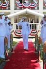 Capt. Greg Burton departs the change of command ceremony at which he relieved Capt. Jamie Kalowsky as the 47th commanding officer of Pearl Harbor Naval Shipyard and Intermediate Maintenance Facility.  The change of command took place in front of the Shipyard Headquarters Building on Friday, July 7, 2017