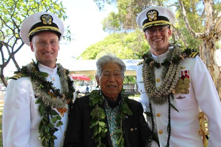 Retired Senator Daniel Akaka of Hawaii is flanked by Capt. Jamie Kalowsky and Capt. Greg Burton following the change of command ceremony for Pearl Harbor Naval Shipyard and Intermediate Maintenance Facility.  Senator Akaka delivered the invocation and benediction at the ceremony, during which Capt. Burton became the Shipyard's 47th commanding officer.  The change of command took place in front of the Shipyard Headquarters Building on Friday, July 7, 2017