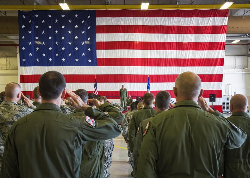 Airmen in the 301st Operations Group salute their new commander during an assumption of command ceremony July 8, 2017, at Naval Air Station Fort Worth Joint Reserve Base, Texas. The group directs the training of assigned personnel to a high-level of combat readiness assuring immediate mobilization, worldwide deployment, employment of the F-16C+ Fighting Falcon's unique precision group attack and offensive capability while maintaining constant vigilance at home and abroad. 