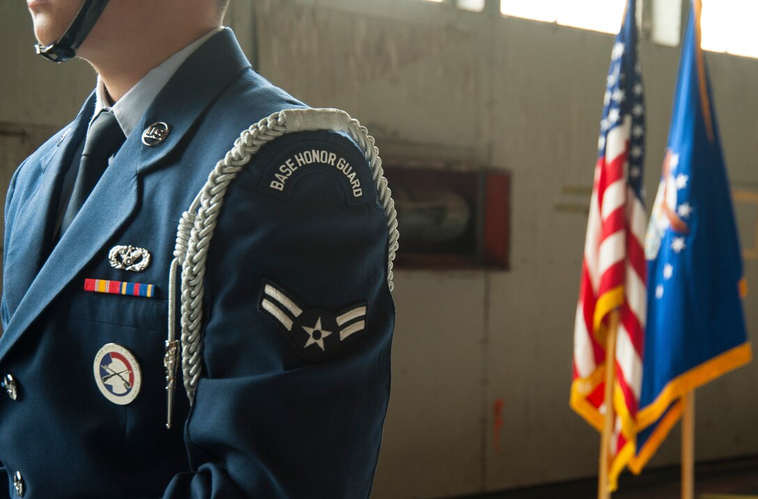 A Joint Base Andrews Base Honor Guard member stands in formation before the 811th Operations Group change of command ceremony at Joint Base Andrews, Md., July 7, 2017. Col. Scott A. Grundahl relieved Col. Fred C. Koegler III as commander of the 811th OG. The group consists of the 811th Operations Support Squadron and the 1st Helicopter Squadron both of which provide the National Capital Region with continuous rotary-wing contingency response. (U.S. Air Force photo by Christopher Hurd)