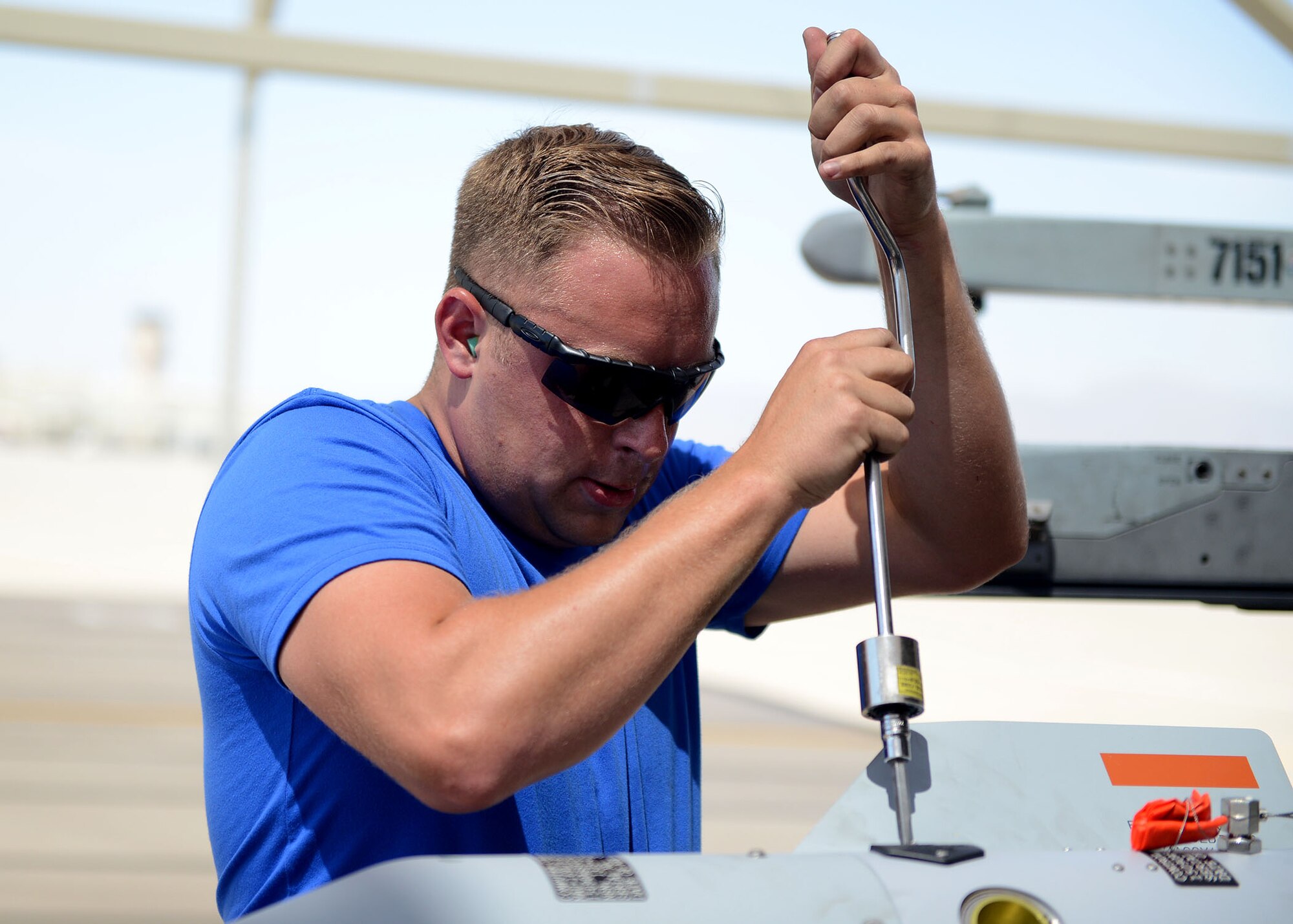 Staff Sgt. Jonathan Picher, 309th Aircraft Maintenance Unit load crew chief, attaches fins to a GBU-12 Paveway II during the quarterly load crew competition at Luke Air Force Base, Ariz., July 7, 2017. The goal of the competition was to load two GBU-12s in under 30 minutes. (U.S. Air Force photo by Senior Airman James Hensley)