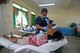 U.S. Air Force Capt. Cindy Lan, dentist with the 374th Dental Squadron, Yokota Air Base, Japan, treats a patient during Pacific Angel 2017 (PACANGEL) in San Remigio, Northern Cebu Province, Philippines, June 30, 2017. PACANGEL is a multilateral humanitarian assistance civil military engagement, which improves military-to-military partnerships in the Pacific while also providing medical health outreach, civic engineering projects and subject matter exchanges among partner forces. (U.S. Air Force photo/Tech. Sgt. Jeff Andrejcik)