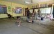 Member of the Pacific Angel 2017 (PACANGEL) civil engineering team lay cement in a San Remigio elementary school classroom in Northern Cebu Province, Philippines, June 29, 2017. Pacific Angel is a multilateral humanitarian assistance civil military engagement, which improves military-to-military partnerships in the Pacific while also providing medical health outreach, civic engineering projects and subject matter exchanges among partner forces. (U.S. Air Force photo/Tech. Sgt. Jeff Andrejcik)