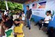 Dr. John Cinco, founder of Pacific Angel (PACANGEL), talks with the children of Anapog Integrated School during PACANGEL 2017 in San Remigio, Northern Cebu Province, Philippines, June 29, 2017. PACANGEL is a multilateral humanitarian assistance civil military engagement, which improves military-to-military partnerships in the Pacific while also providing medical health outreach, civic engineering projects and subject matter exchanges among partner forces. (U.S. Air Force photo/Master Sgt. Jeff Andrejcik)