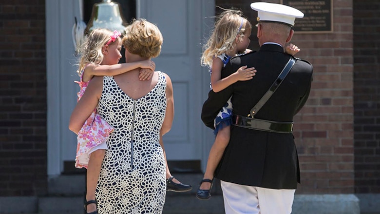 U.S. Marine Corps Lt. Gen. Jon M. Davis, deputy commandant, Aviation, and his wife Carol walk down center walk with their grandchildren during his retirement ceremony at Marine Barracks Washington, Washington, D.C., July 10, 2017. Davis retired after 37 years of service. 