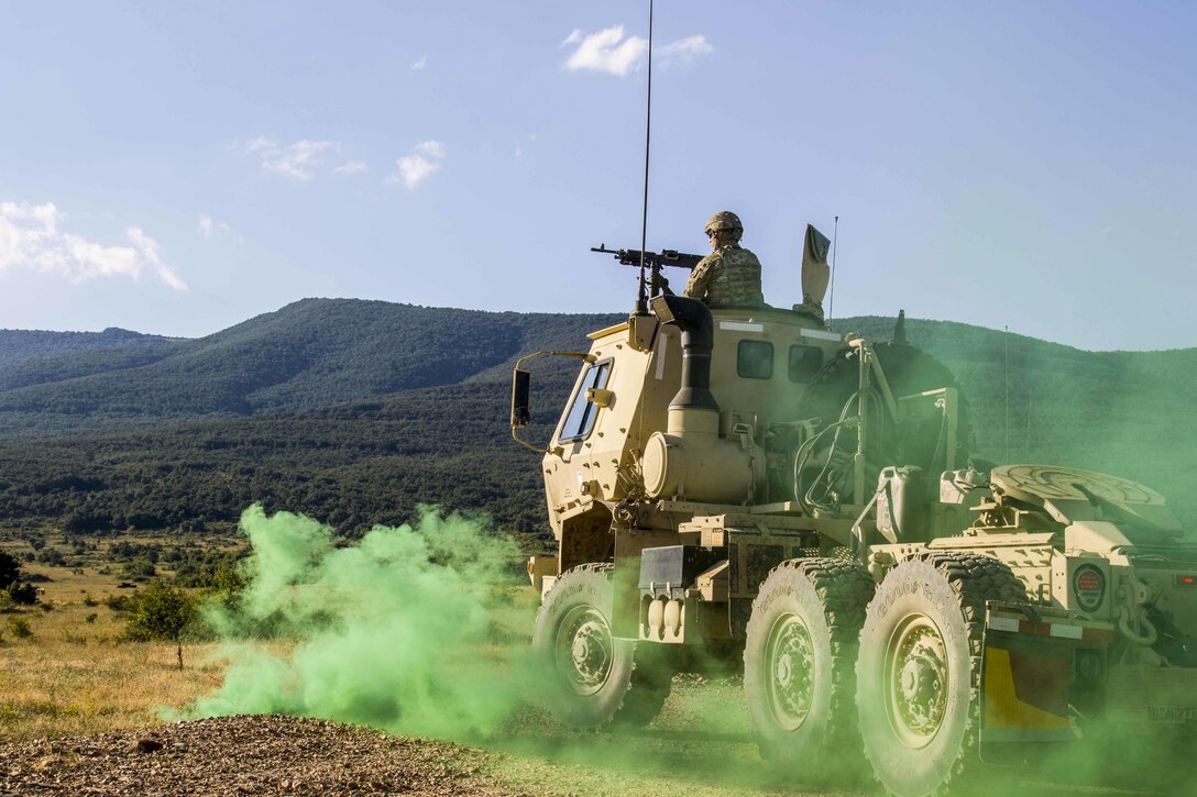 A soldier engages a target during a convoy live-fire exercise at Novo Selo Training Area, Bulgaria, July 7, 2017, as part of exercise Saber Guardian 17. The soldiers are assigned to the 277th Aviation Support Battalion. Army photo by Spc. Thomas Scaggs