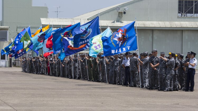 Japanese forces host a welcoming ceremony for the arrival of Marine Fighter Attack Squadron (VMFA) 232 at Japan Air Self-Defense Force (JASDF) Hyakuri Air Base, Japan July 7, 2017. This is the first time VMFA-232 arrived at JASDF Hyakuri Air Base, which gives local Japanese forces the ability to simulate air-to-air maneuvers with unfamiliar aircraft. VMFA-232 is conducting exercises with the JASDF as part of the Aviation Training Relocation (ATR) Program. The ATR is designed to increase operational readiness and bilateral interoperability between U.S. and Japanese forces, and reduce local noise impacts by dispersing unilateral jet-fighter training of U.S. forces in Japan. (U.S. Marine Corps photo by Lance Cpl. Mason Roy)