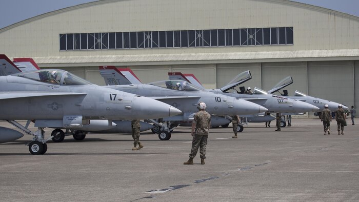 U.S. Marines with Marine Fighter Attack Squadron (VMFA) 232, taxi in F/A-18C Hornets at Japan Air Self-Defense Force (JASDF) Hyakuri Air Base, Japan, July 7, 2017. VMFA-232 is conducting exercises with the JASDF as part of the Aviation Training Relocation (ATR) Program. The ATR is designed to increase operational readiness and bilateral interoperability between U.S. and Japanese forces. (U.S. Marine Corps photo by Lance Cpl. Mason Roy)