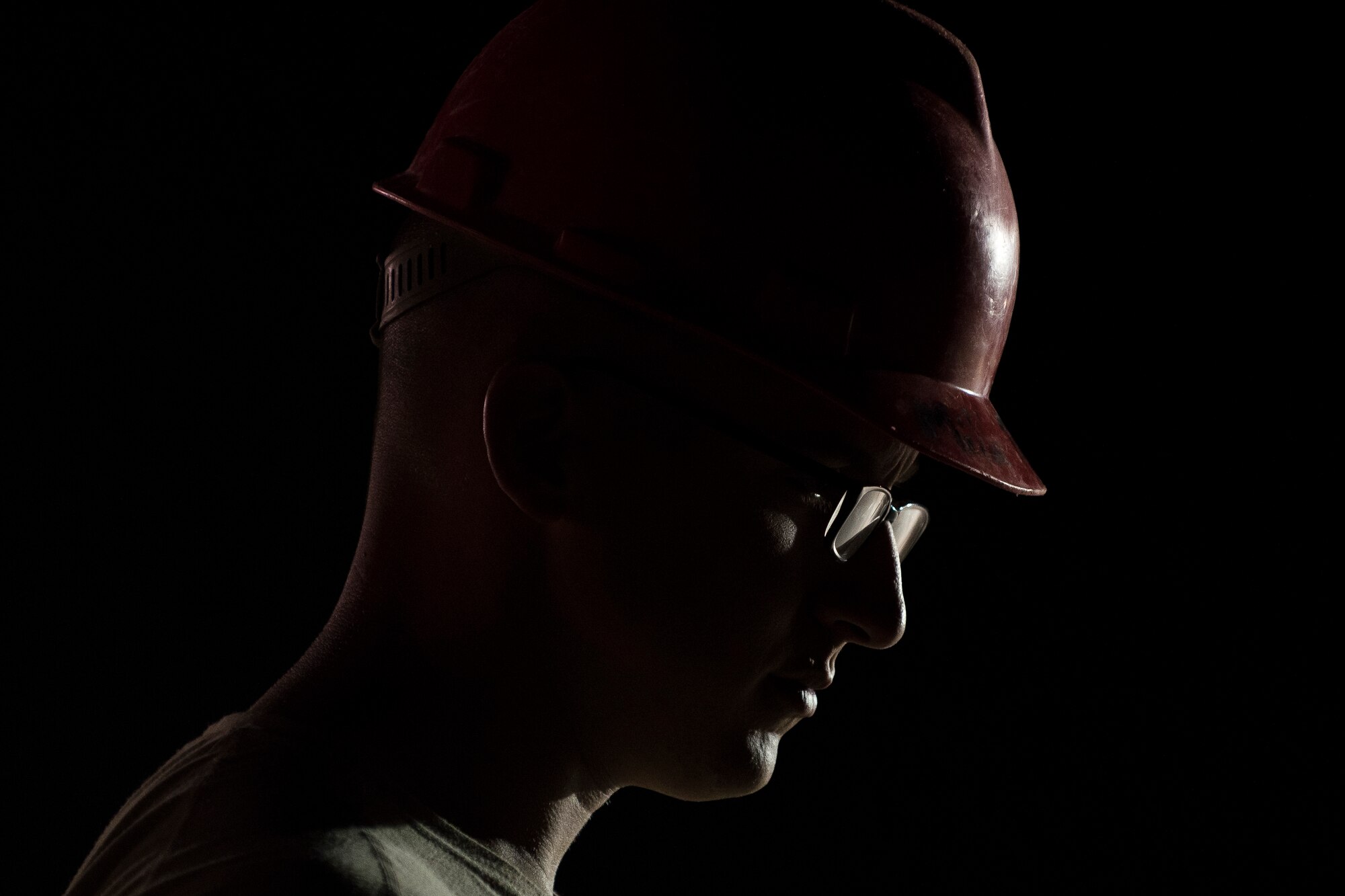 Senior Airman Zachary Miller, 557th Expeditionary RED HORSE structural journeyman, works on a construction site June 27, 2017, in Southwest Asia. The squadron is tasked with constructing a new 332nd Air Expeditionary Wing mission support industrial complex and life support area, to include facilities, utilities and roads, providing the wing with increased capabilities.(U.S. Air Force photo/Senior Airman Damon Kasberg)