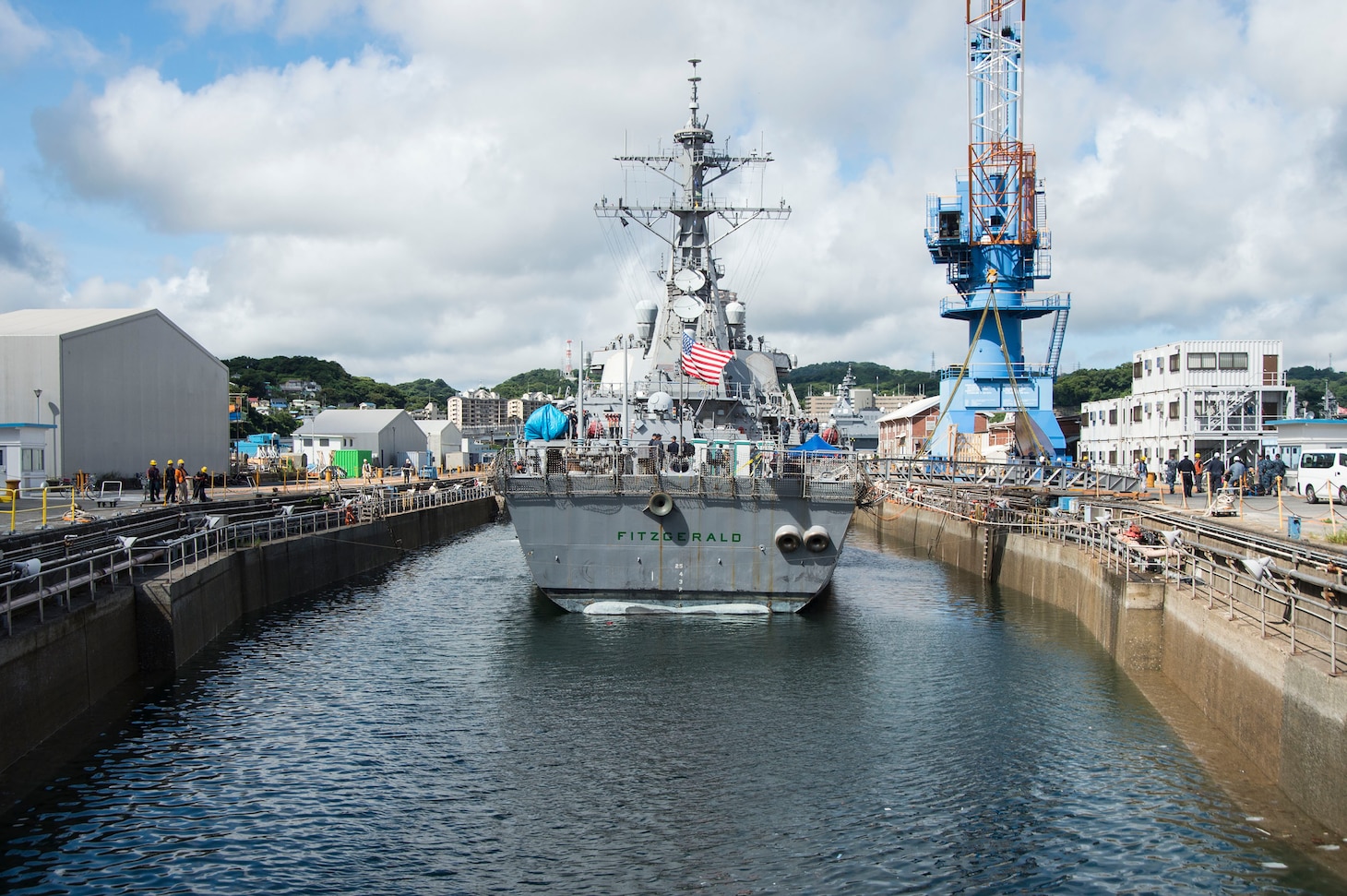 YOKOSUKA, Japan (July 11, 2017) Arleigh Burke-class ) Arleigh Burke-class guided-missile destroyer USS Fitzgerald (DDG 62) is positioned into Dry Dock 4 at Fleet Activities (FLEACT) Yokosuka. Fitzgerald is entering dry dock at
FLEACT Yokosuka to continue repairs and assess damage sustained from its June 17 collision with a merchant vessel. 
