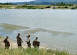 Soldiers of the Georgia Army National Guard’s 648th Maneuver Enhancement Brigade reconnoiter possible bridging sites on the Olt River in preparation for Exercise Saber Guardian 17 on July 7, 2017.