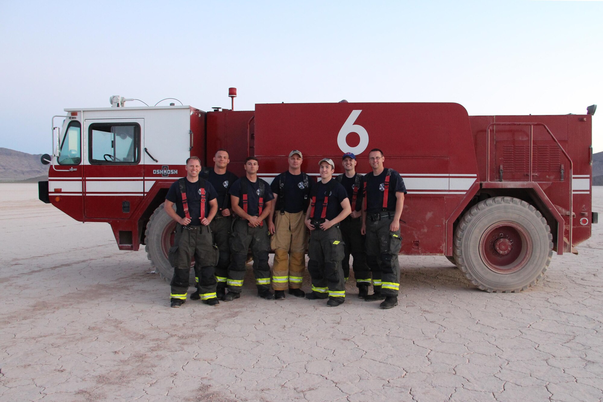 A team of seven McConnell firefighters pose for a photo at Texas Lake, Nevada, June 2, 2017. The crew supported the Air Force Weapons School’s capstone event when other Air Force fire departments were unable to support it. (Courtesy photo)