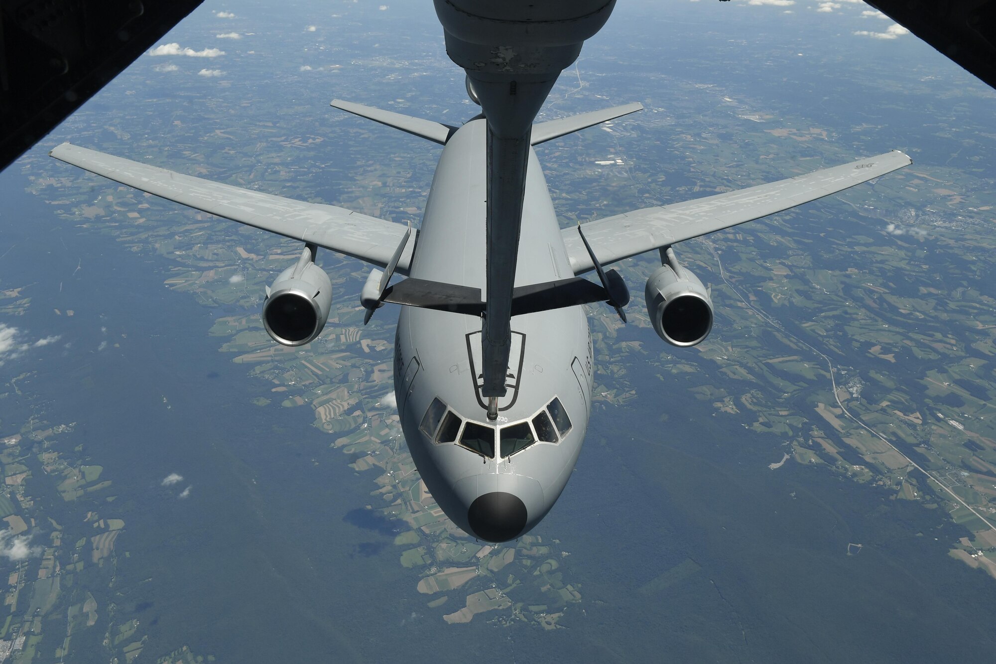 A KC-10 Extender from Joint Base McGuire-Dix-Lakehurst, New Jersey, is refueled mid-flight during a training exercise to prepare the air crews to support Global Reach for Talisman Sabre 17, July 9, 2017. A formation of three KC-10 Extender tested their in-air refueling systems while flying to the Pacific to support the exercise. 