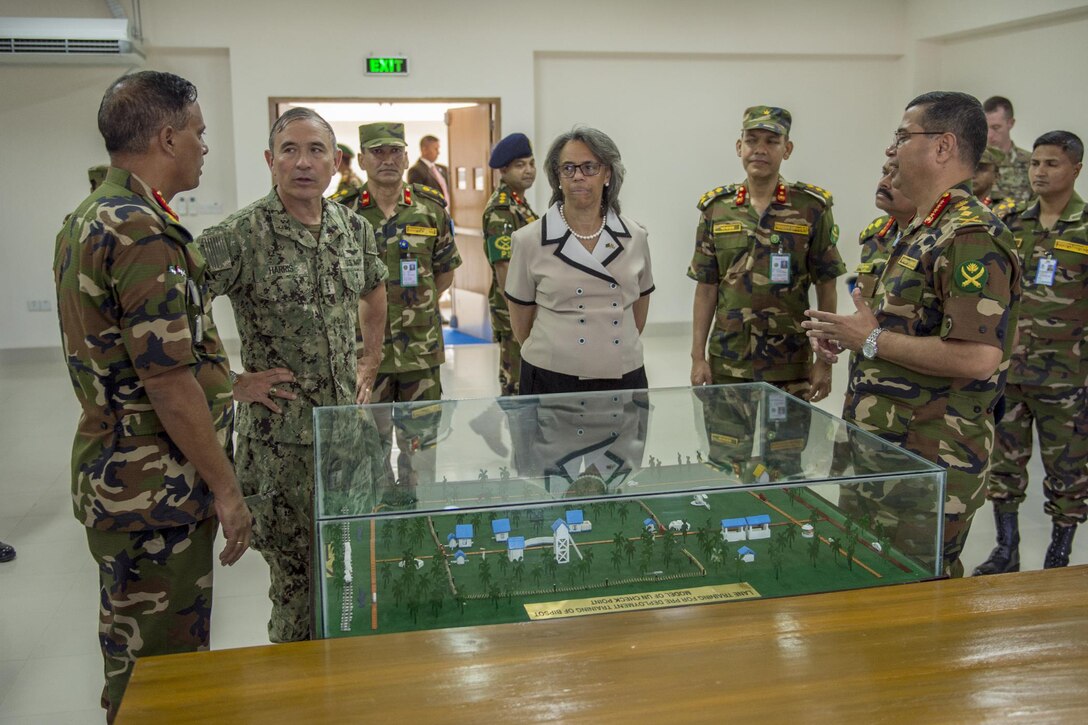 Navy Adm. Harry Harris, second from left, commander of U.S. Pacific Command, and U.S. Ambassador to Bangladesh Marcia Bernicat, center, tour the war game room at the new $3.6 million multipurpose training facility at the Bangladesh Institute of Peace Support Operation Training with Maj. Gen. Enayet Ullah, the institute’s commandant, and Bangladesh Chief of Army Staff Gen. Belal, in Gazipur, Bangladesh, July 8, 2017. Navy photo by Petty Officer 2nd Class Robin W. Peak