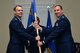 U.S. Air Force Lt. Col. Jason Kulchar, 51st Intelligence Squadron (IS) commander, receives the 51st IS guidon from Col. Michael Johanek, 365th Intelligence, Surveillance and Reconnaissance Group commander, during a change of command ceremony at Shaw Air Force Base, S.C., July 10, 2017. The 51st IS maintains analytical expertise across adversary air, air defense, cruise and ballistic missiles, and space domains. (U.S. Air Force photo by Senior Airman Christopher Maldonado)
