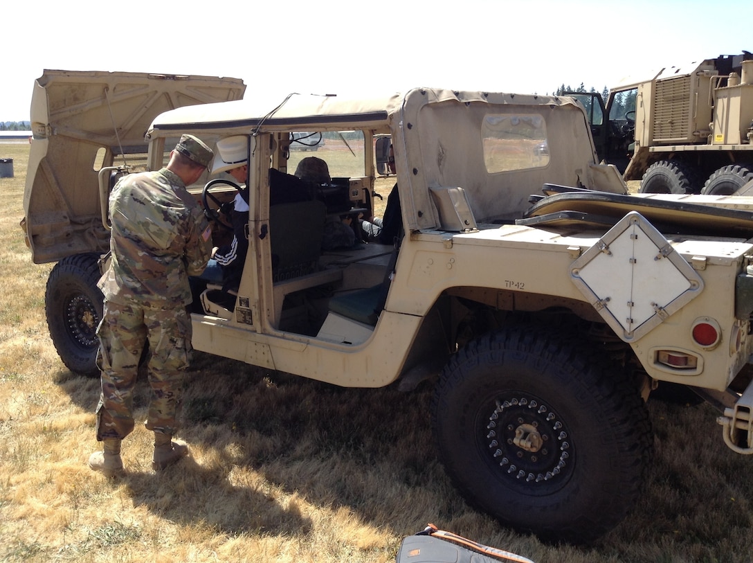 The 364th ESC along with soldiers from the 477th Transportation and 483rd Quartermaster Company provides support to the Arlington Fly-In 7-8 July, 2017, in Arlington, Wash., to promote community relations with the City of Arlington and the surrounding areas.