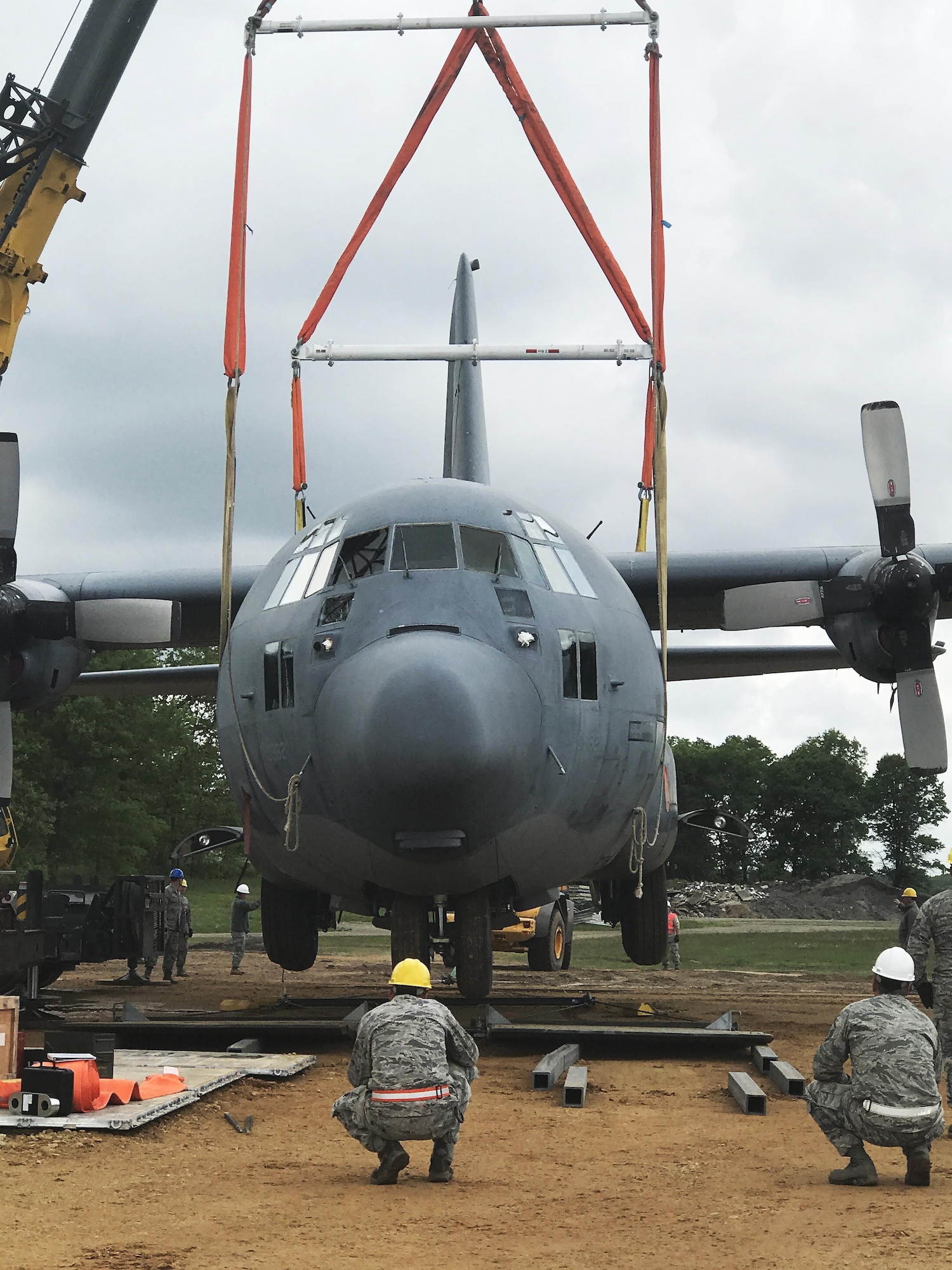 Students attempt to lift a C-130J Special Operations Aircraft that has never been lifted at the Volk Air National Guard base before. The Airmen are students of a Crash Damage or Disabled Aircraft Recover (CDDAR) training course hosted at the base on May 23. They are lifting the 84,000-pound aircraft to fulfill a training requirement for CDDAR team members. Wisconsin National Guard photo by Maj. Penny Ripperger