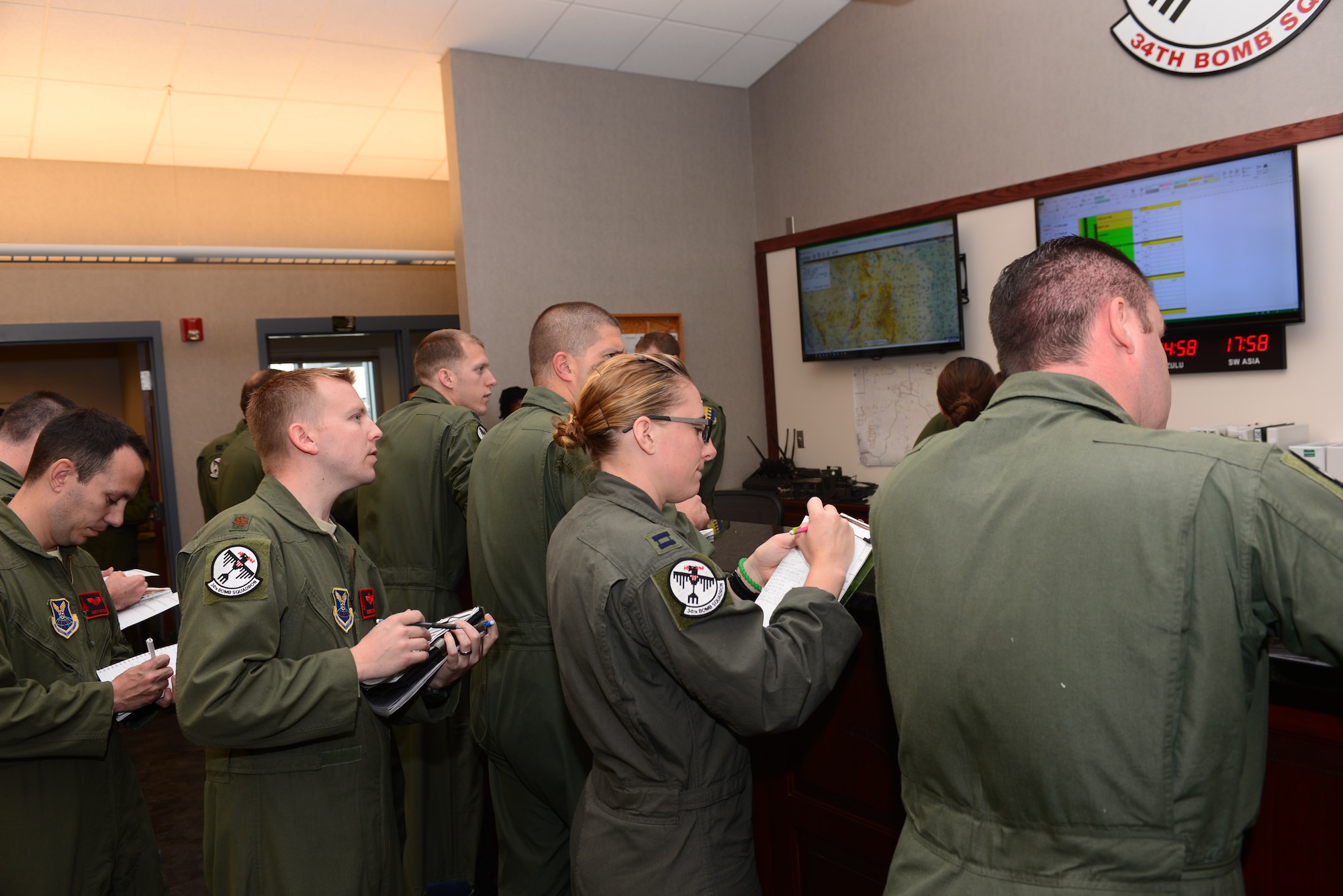 Pilots and weapon systems officers attend a step brief in preparation for Red Flag at Ellsworth Air Force Base, S.D., July 6, 2017. The exercise will take place from July 10 to 28 and will provide participants with realistic training in a combined air, ground, space and electronic threat environment to maximize the combat readiness, capability and survivability of participating units. (U.S. Air Force photo by Airman 1st Class Donald C. Knechtel)