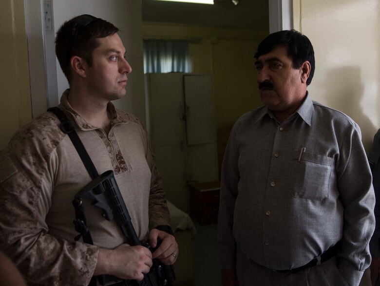 A U.S. Navy Sailor with Task Force Southwest gets a tour from his counterpart of the medical facility at the Helmand Provincial Police Headquarters in Lashkar Gah, Afghanistan, July 9, 2017. This mission provided an opportunity for advisors to meet with their counterparts, review the security posture at the PHQ and ensure that Afghan National Defense and Security Forces have an effective defense of Lashkar Gah. (U.S. Marine Corps photo by Sgt. Justin T. Updegraff)