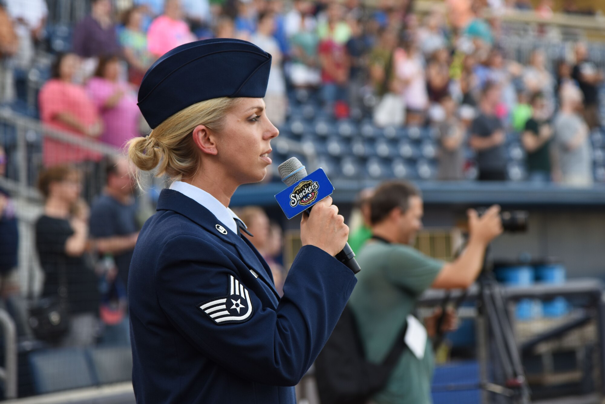 Staff Sgt. Jordan Watson, 41st Aerial Port Squadron transportation craftsman, sings the national anthem during the Biloxi Shuckers Minor League Baseball team’s military appreciation night July 8, 2017, in Biloxi, Miss. The Shuckers recognized and honored service members and their families for the dedication, commitment and sacrifices they make for the nation. (U.S. Air Force photo by Kemberly Groue)