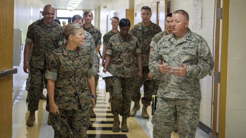 Brig. Gen. Helen G. Pratt, the commanding general of 4th Marine Logistics Group, Marine Forces Reserve, tours East Saint John High School with leaders of the Louisiana Innovative Readiness Training project in Reserve, Louisiana on July 10, 2017. This year's IRT builds mutually beneficial civil-military partnerships between local communities to provide high quality, mission-essential training for service members and their units. 