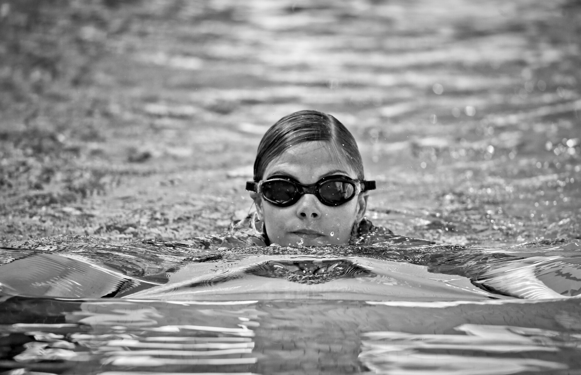 Air National Guard Master Sgt. Kimberley Kaminski swims the 100 meter portion of the German Armed Forces Badge for Military Proficiency test at Joint Base McGuire-Dix-Lakehurst, N.J., June 13, 2017. (U.S. Air National Guard photo by Master Sgt. Matt Hecht/Released)