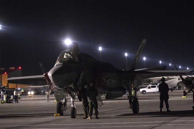 Marines with Marine Fighter Attack Squadron (VMFA) 211 “Wake Island Avengers,” 3rd Marine Aircraft Wing, prepare an F-35B Lightning II to fly on the  first day of Red Flag 17-3 at Nellis Air Force Base, Nev., July 10. Red Flag 17-3 is a realistic combat training exercise involving the U.S. Air Force, Army, Navy and Marine Corps and this iteration is the first to have both the Air Force’s F-35A Lightning II and the Marine Corps’ F-35B Lightning II, which is capable of short takeoff vertical landing (STOVL). (U.S. Marine Corps photo by Sgt. Lillian Stephens/Released)