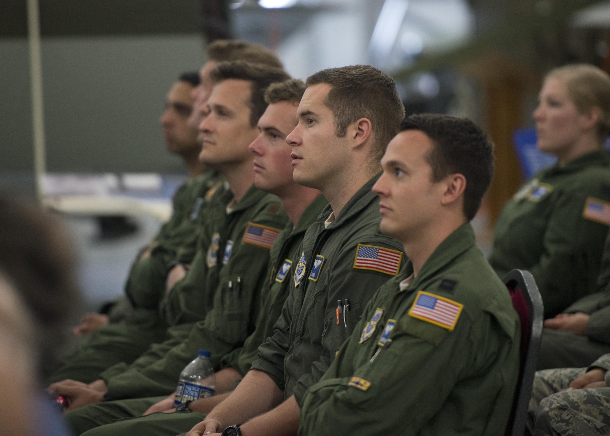 Team Dover aviators listen to a presentation given by Maj. Gen. Carol Timmons, adjutant general of Delaware, during a Hangar Talk June 6, 2017, at the Air Mobility Command on Dover Air Force Base, Del. One of the event’s purposes was to promote aviation heritage by sharing experiences between generations of aviators. (U.S. Air Force photo by Senior Airman Zachary Cacicia)