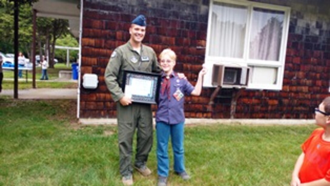 Capt. Matthew Roy, 326th Airlift Squadron C-17 Globmeaster III pilot, and Jay Plaisted pose for a photo May 23, 2017, in Harrington, Delaware. Roy volunteers as Plaisted’s Big Brother through the Big Brother Big Sister of Delaware organization. (Courtesy photo)