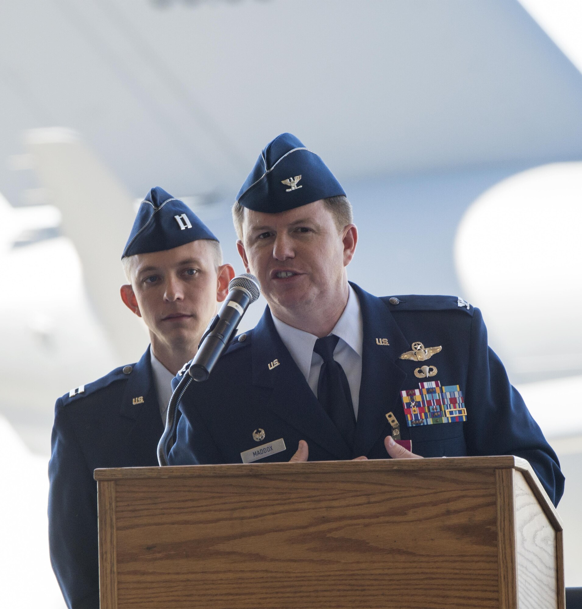 U.S. Air Force Col. Christopher V. Maddox, 60th Operations Group commander, gives a speech during the 60th OG Change of Command ceremony at Travis Air Force Base Calif., July 7, 2017. The ceremony is rooted in military history dating back to the 18th Century where the command flag is passed to the individual assuming command in the presence of the entire unit. (U.S. Air Force photo Heide Couch)