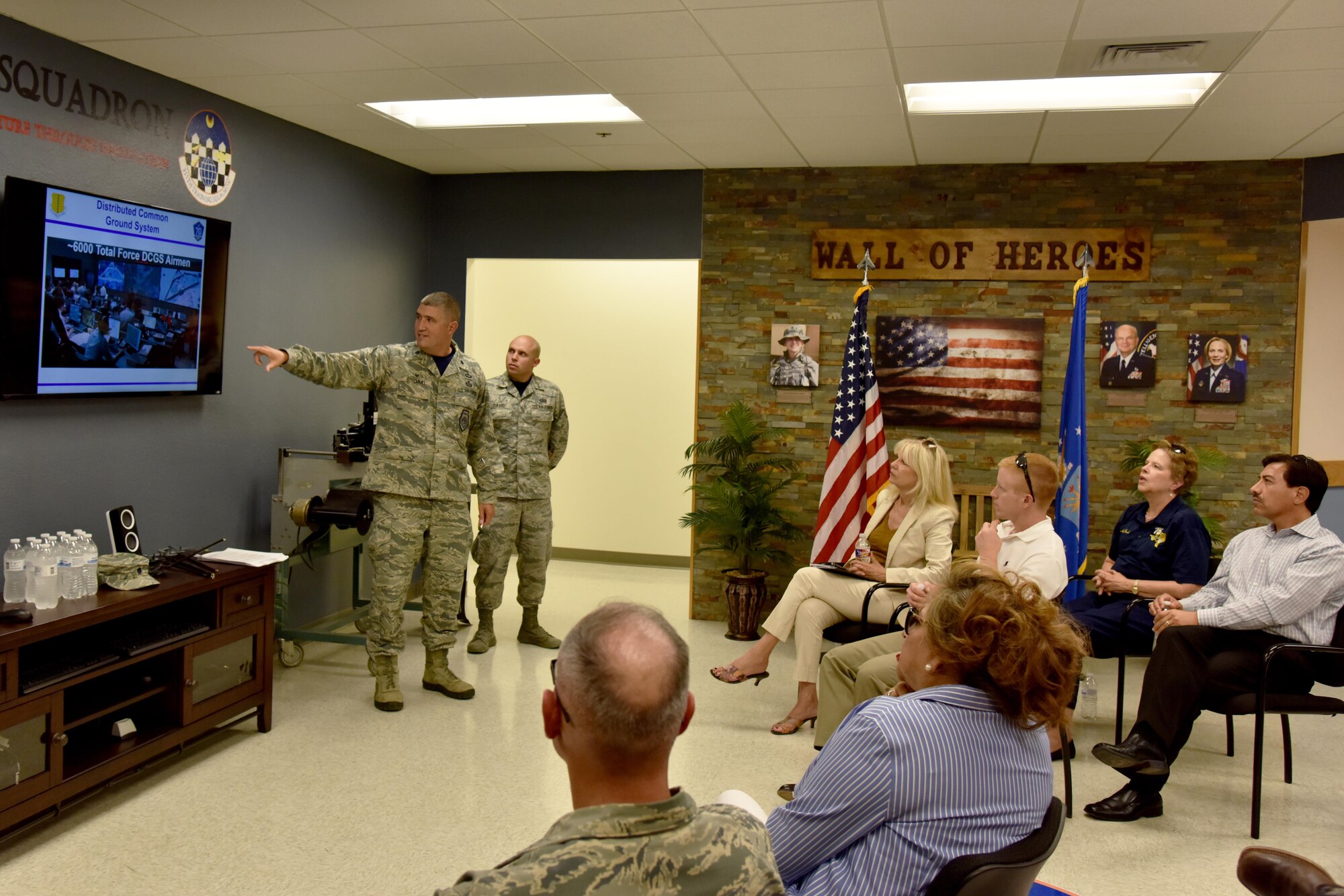 U.S. Air Force Lt. Col. Kenneth Stremmel, 315th Training Squadron Commander, briefs community leaders about intelligence training at the Di Tommaso Hall on Goodfellow Air Force Base, Texas, July 7, 2017. Stremmel and other base leaders lead a tour to help orient San Angelo, Texas community leaders to the base. (U.S. Air Force photo by Staff Sgt. Joshua Edwards/Released)