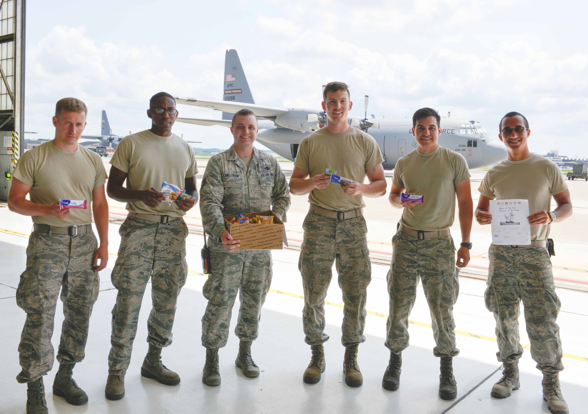 An unexpected treat arrives at the 934th July 10 as snacks from employees at the AT&T call centers arrived to express thanks to our Airmen as part of Military Appreciation Month. (Air Force Photo/Paul Zadach)