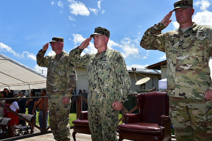 Col. Keith McKinley (left), Joint Task Force-bravo commander, Admiral Kurt Tidd (center) commander of U.S. Southern Command and Col. Brian Hughes (right), former commander of JTF-Bravo salute the formation at Soto Cano Air Base, Honduras during the Change of Command ceremony July 10th, 2017. 
