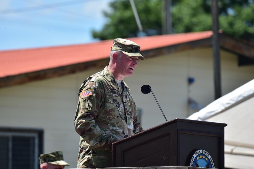 U.S. Army Col. Brian Hughes, former Joint Task force-Bravo commander, gives his closing remarks during the change of Command ceremony July 10, 2017 at Soto Cano Air Base, Honduras. Distinguished guests joined the Soldiers, Airmen and Marines to witness the passing of the colors from Col. Brian Hughes to Col. Keith McKinley as he relinquished command of the Task Force.