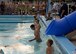 U.S. Naval Sea Cadet Corps cadets plunge into a pool in preparation for a swim evaluation at Tyndall Air Force Base, Fla., June 25, 2017. The USNSCC is a Department of the Navy program for young adults, ages 16 to 18, aimed at fostering an improved image and understanding of what the maritime services have to offer. (U.S. Air Force photo by Airman 1st Class Isaiah J. Soliz/Released)